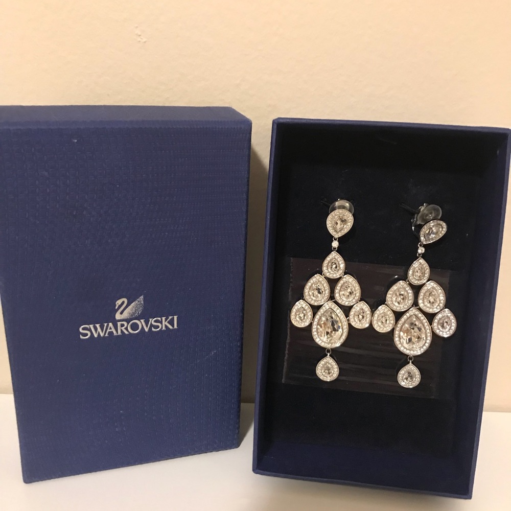Swarovski earrings on clips. No missing crystals.